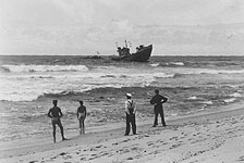 HMS Northern Isles run aground on the rocks off Durban Bluff 